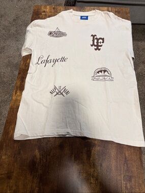 100% cotton Short Sleeve Graphic Tee in Cream and brown size L